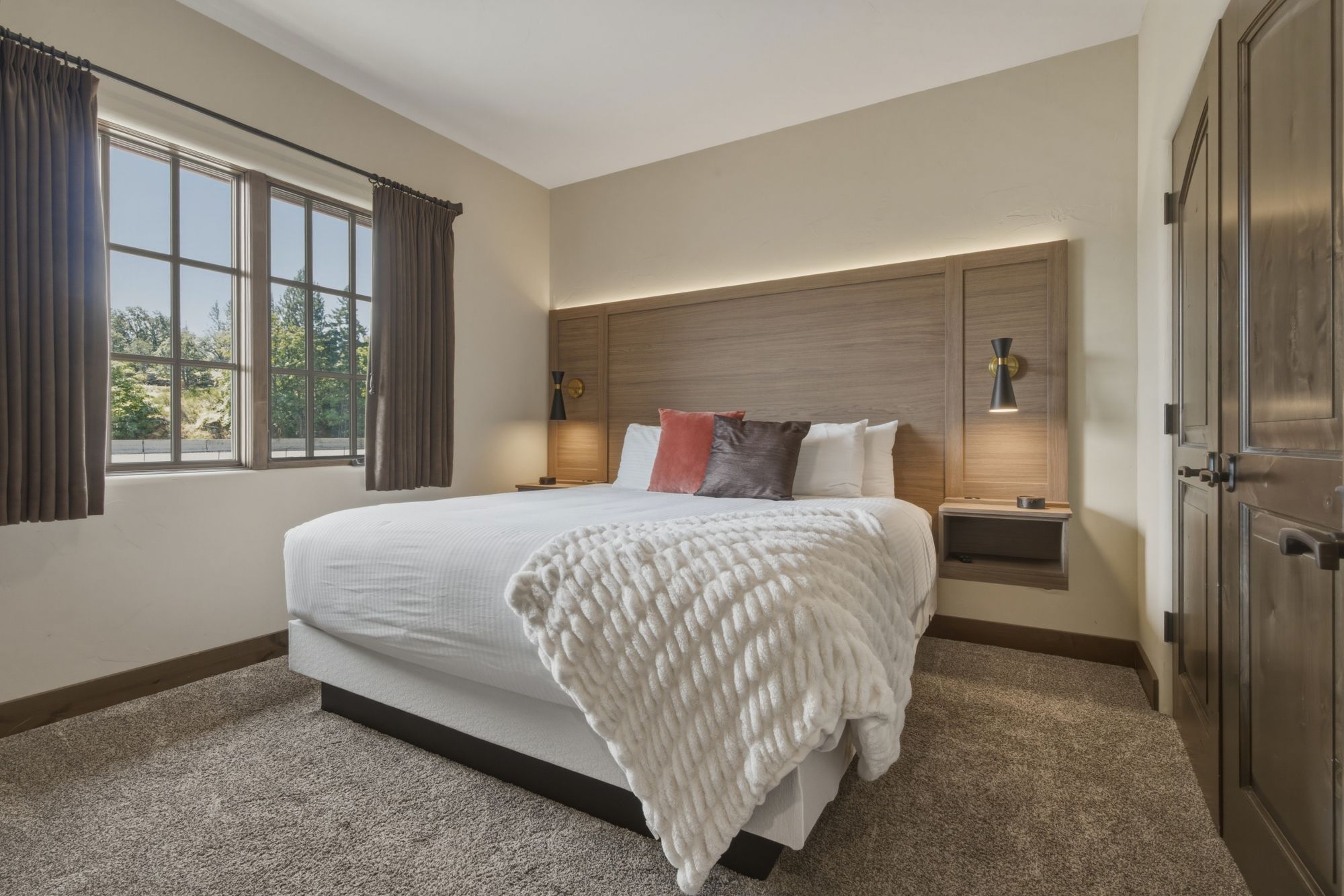 Carriage House main bedroom with ample natural light