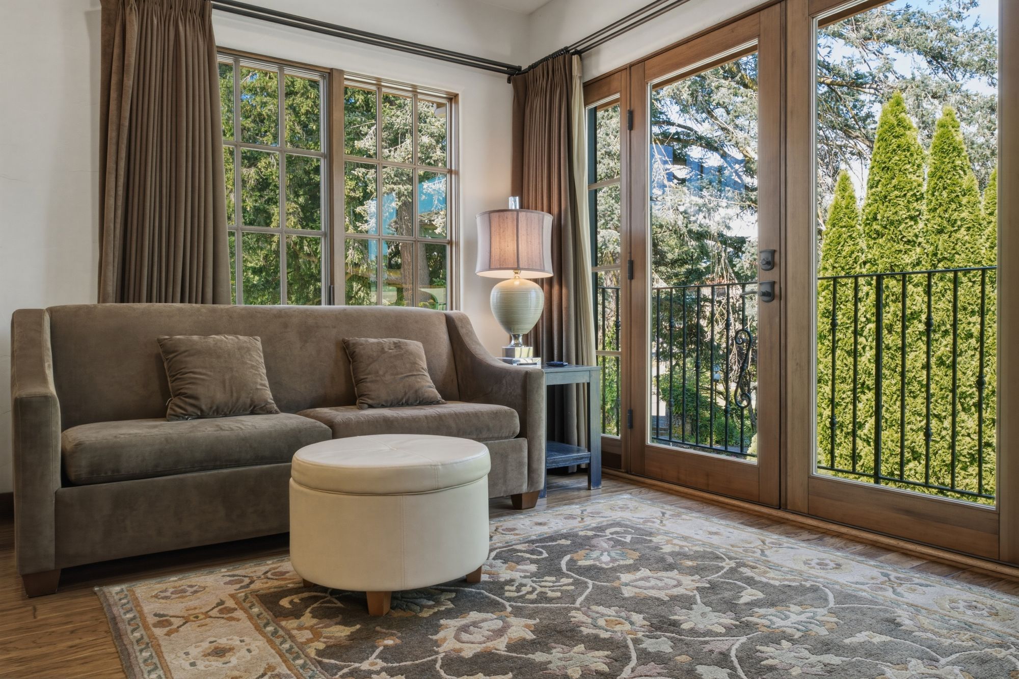 Carriage House living room with ample natural light and views